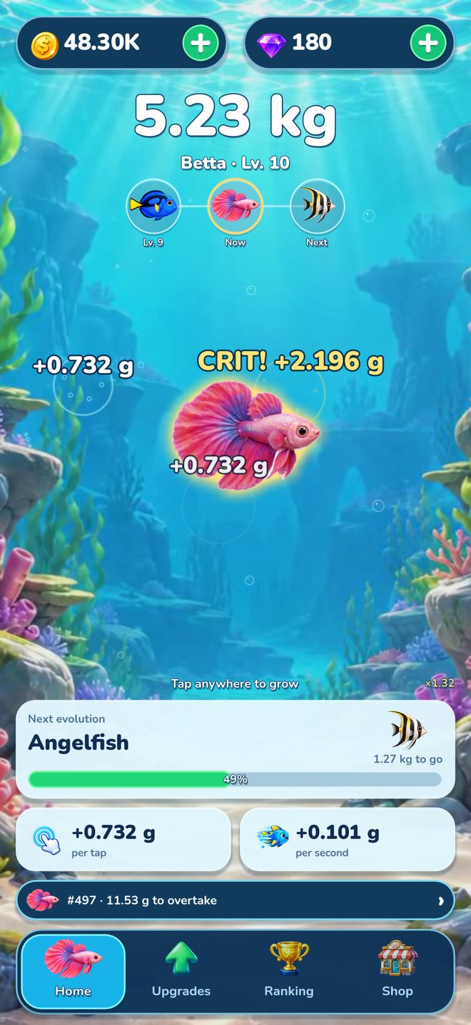 BIG FISH! on a phone: a pink betta fish, its mass, and the growth it gains from each tap.